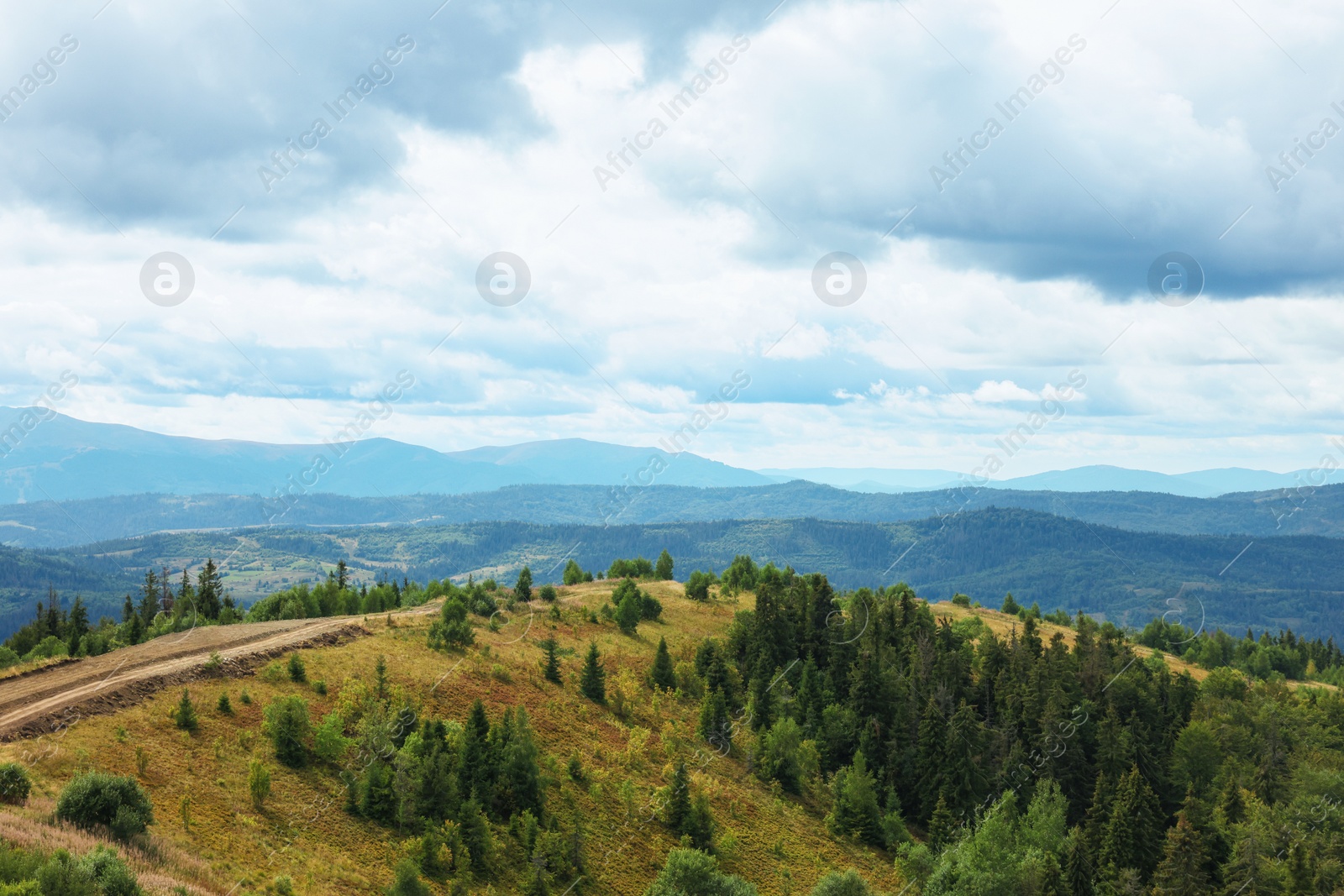 Photo of Picturesque view of mountain landscape and cloudy sky