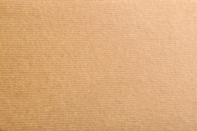 Photo of Sheet of kraft paper as background, top view. Recycling concept