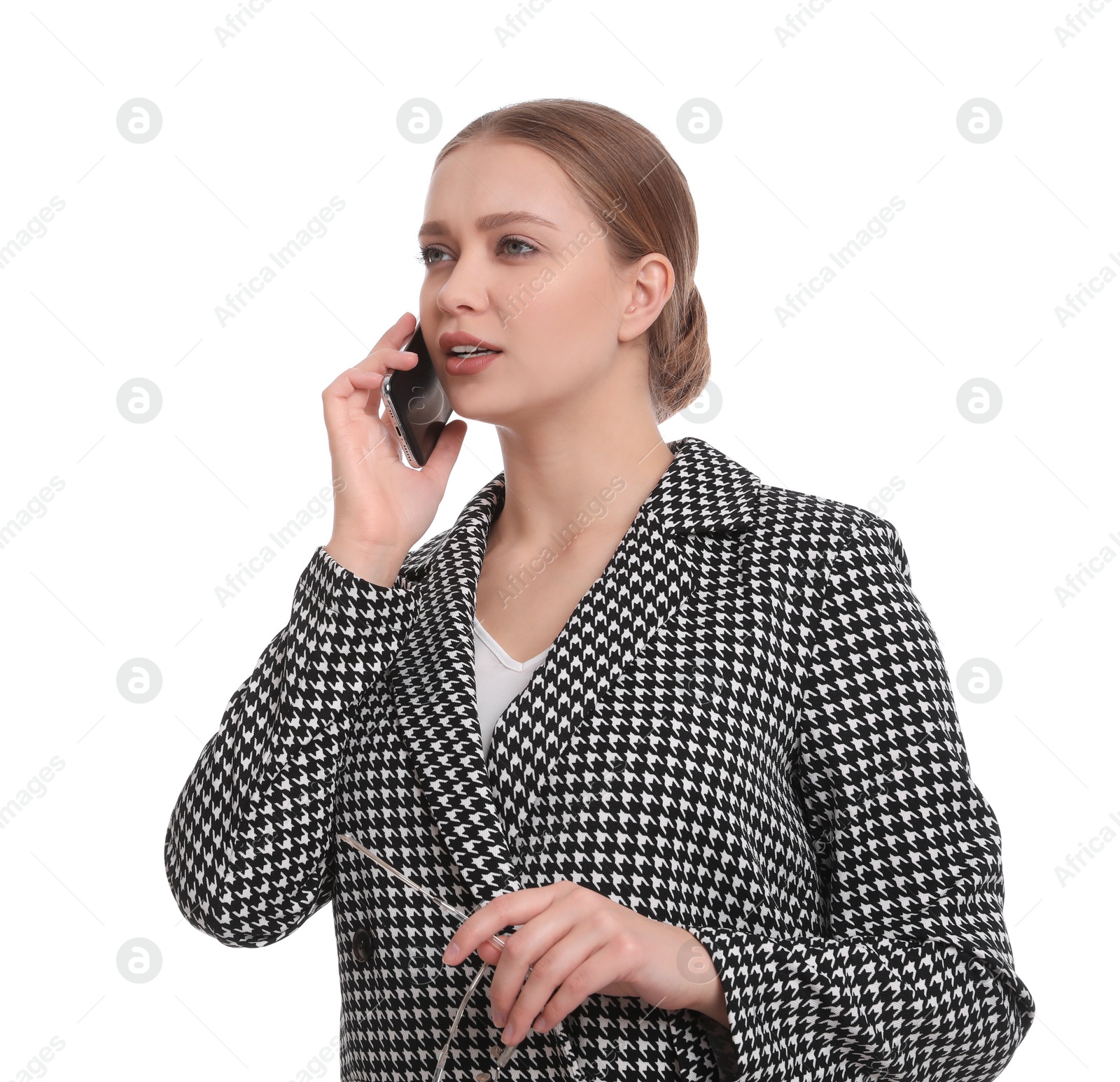 Photo of Young businesswoman talking on mobile phone against white background