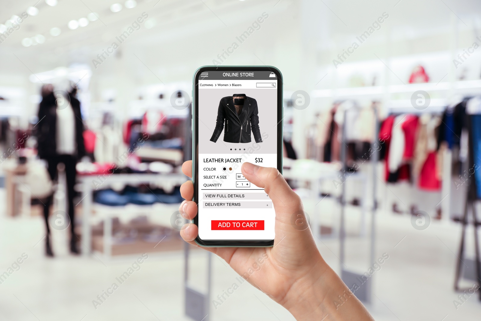 Image of Woman visiting shop to take ordered jacket indoors, closeup. Online store website on device screen