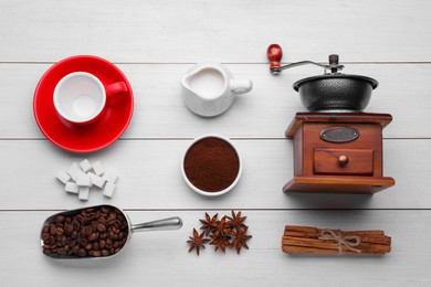 Photo of Flat lay composition with vintage manual coffee grinder and spices on white wooden background