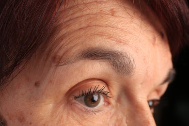 Photo of Skin care. Senior woman, closeup view of eye