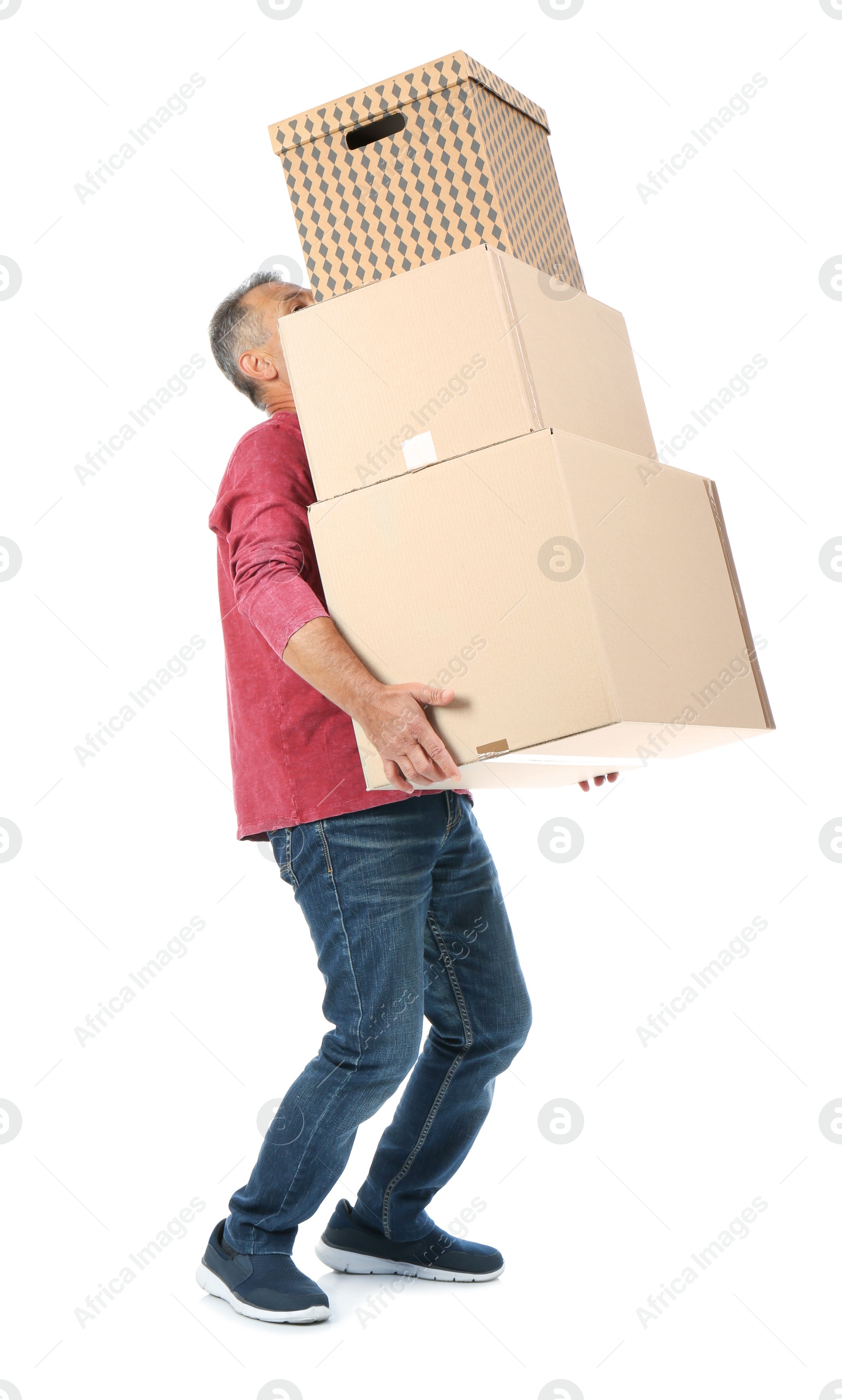 Photo of Mature man carrying carton boxes on white background. Posture concept