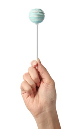 Photo of Woman holding sweet cake pop on white background, closeup