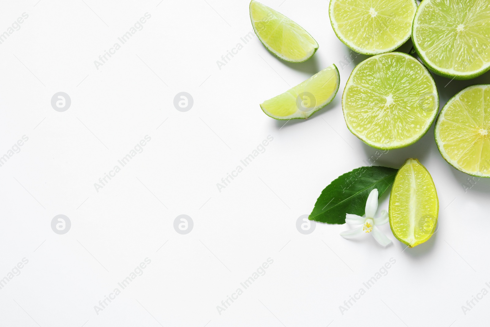 Photo of Fresh limes on white background, top view. Citrus fruits