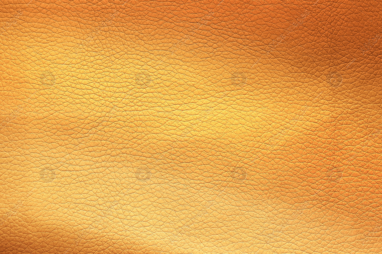 Image of Golden textured surface as background, closeup view