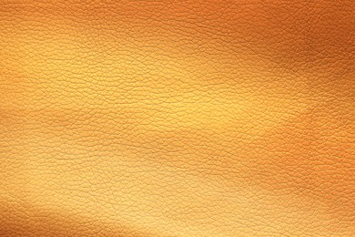 Image of Golden textured surface as background, closeup view