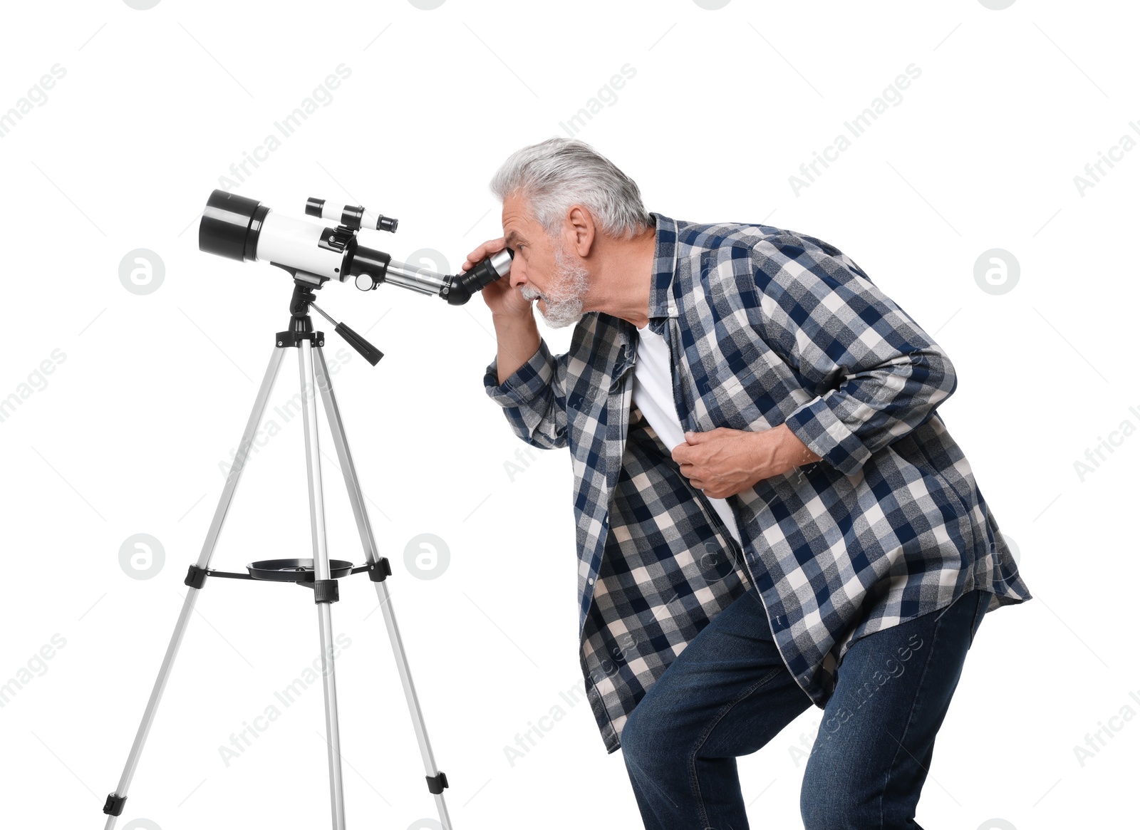 Photo of Senior astronomer looking at stars through telescope on white background