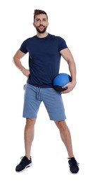 Photo of Athletic man with medicine ball isolated on white