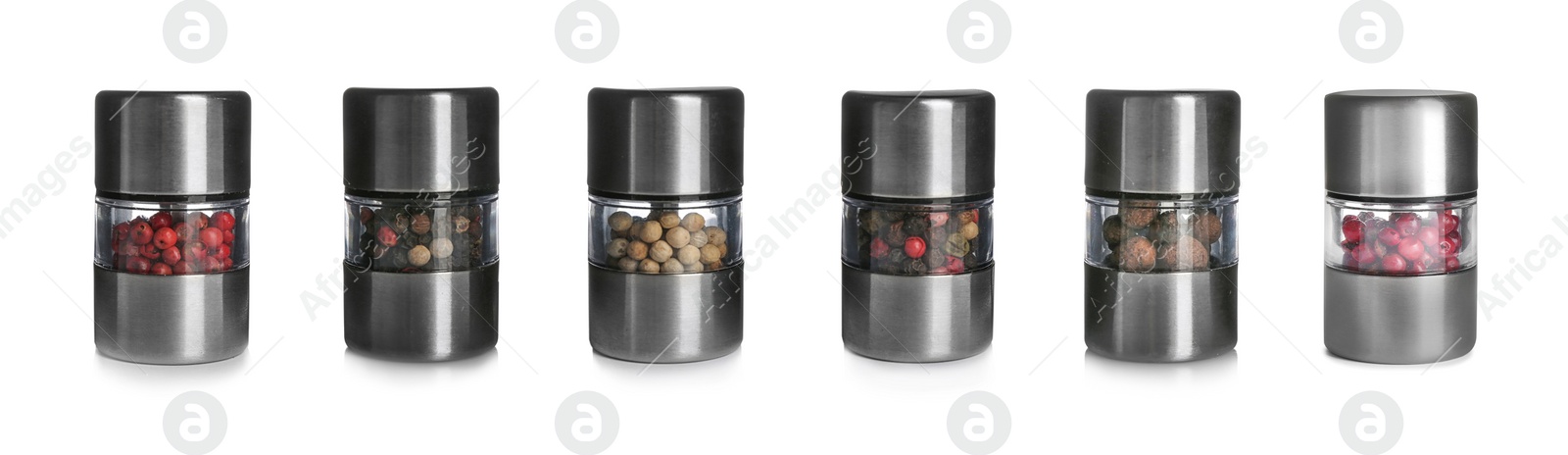 Image of Set of grinders with different peppercorns on white background. Banner design 