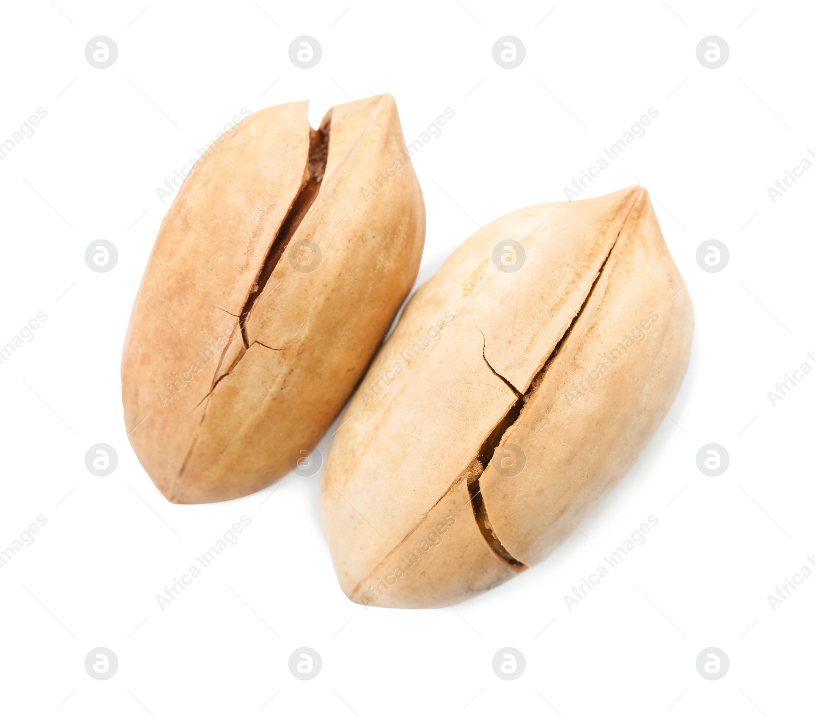 Photo of Pecan nuts in shell on white background, top view. Nutritive food