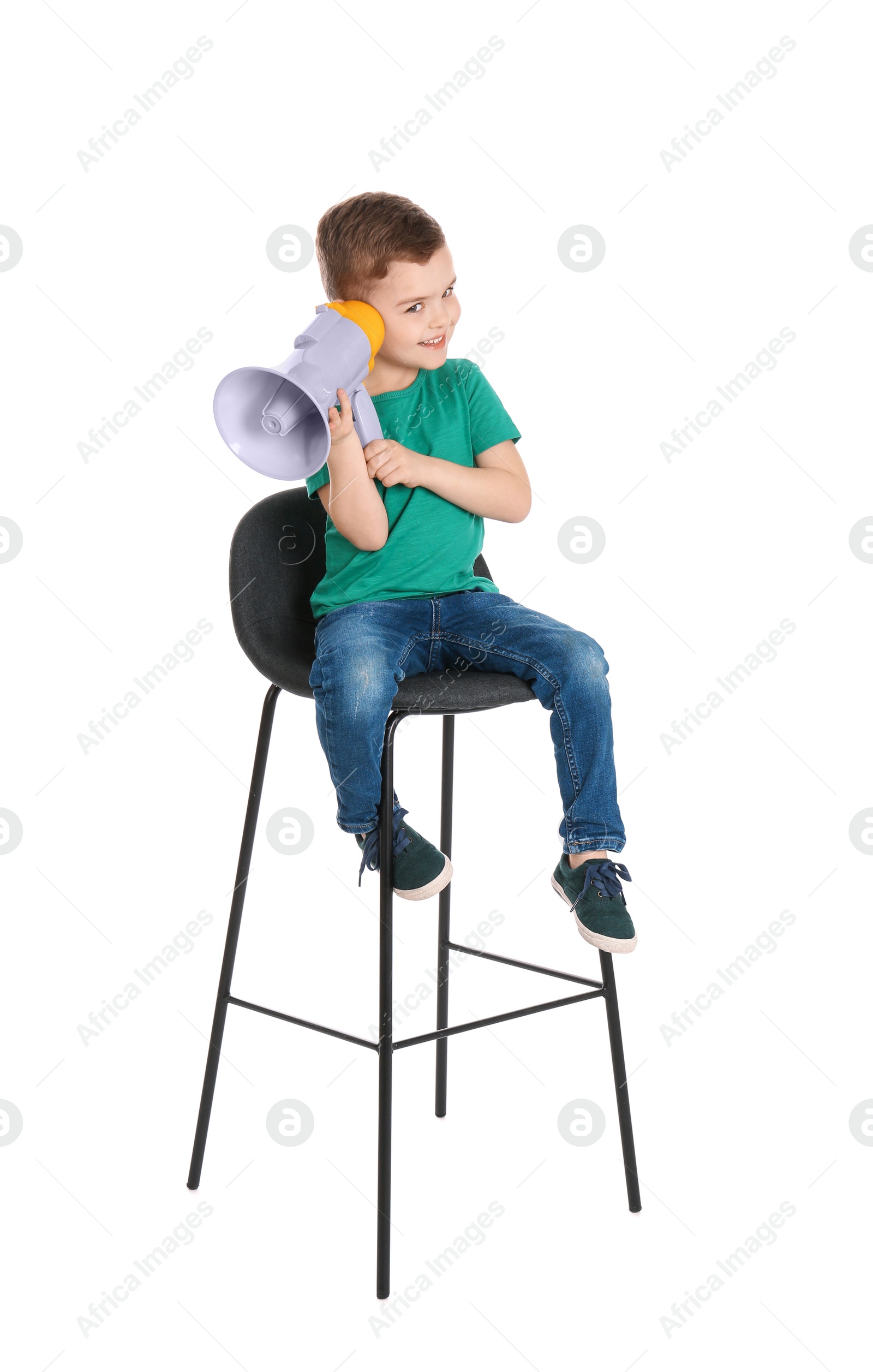 Photo of Adorable little boy with megaphone on white background