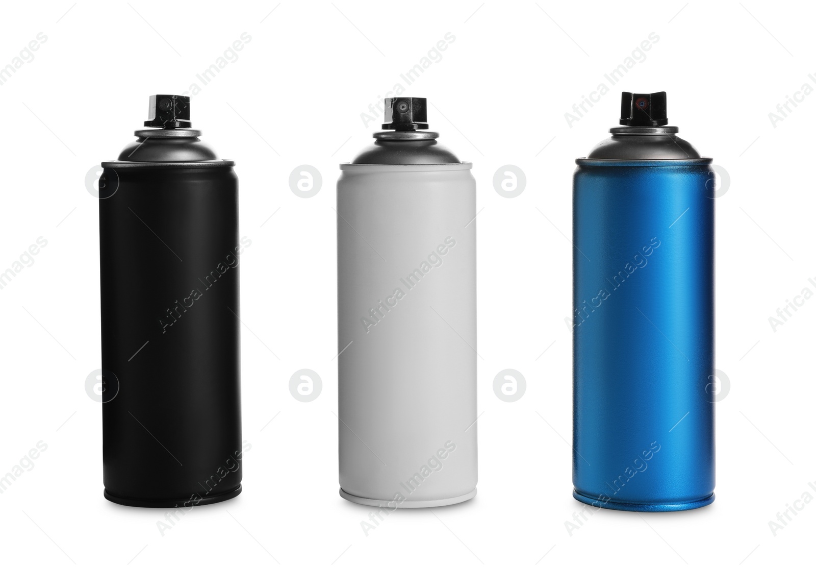 Photo of Cans of different spray paints on white background. Graffiti supplies