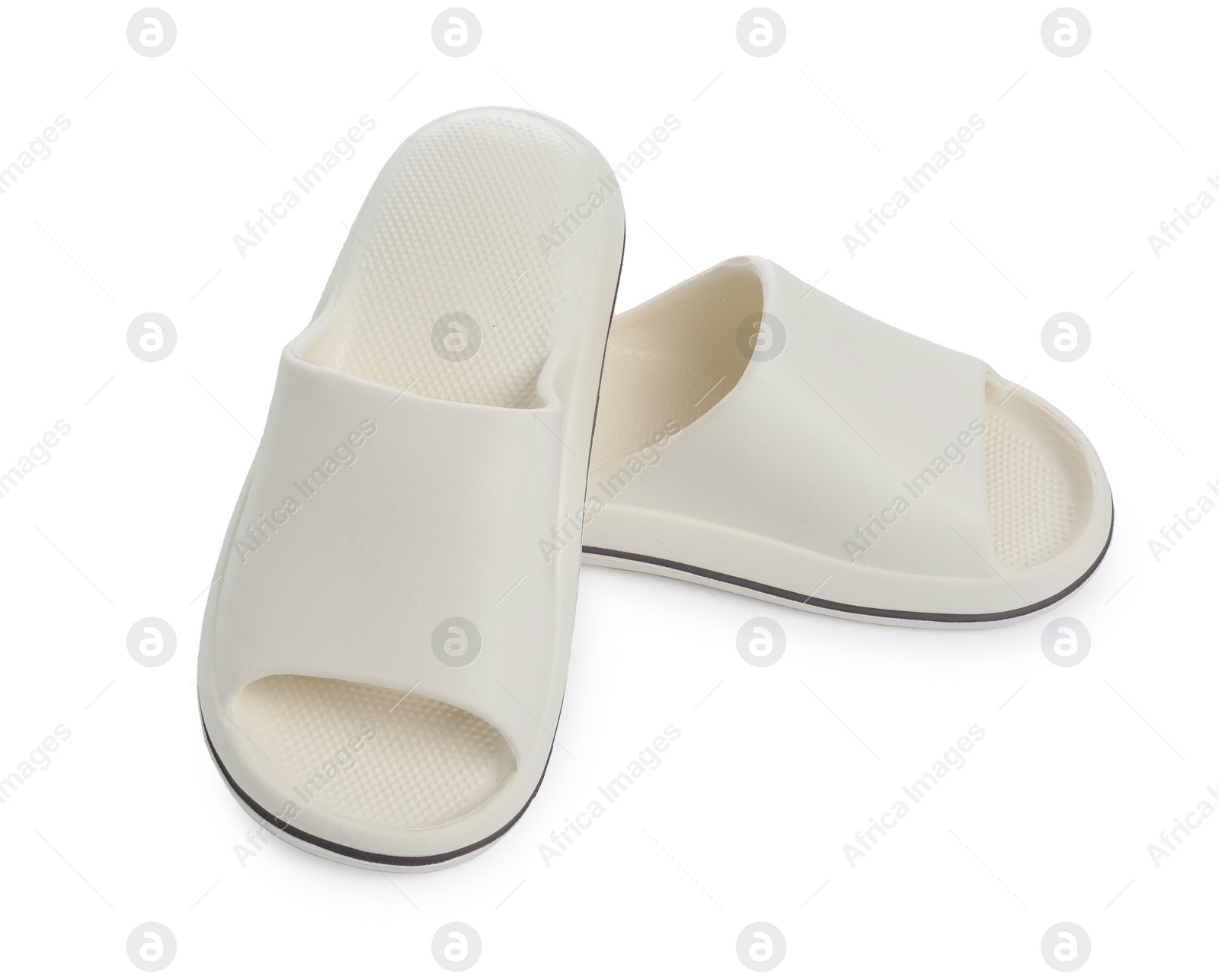 Photo of Pair of rubber slippers isolated on white