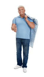 Photo of Senior man holding garment cover with clothes on white background. Dry-cleaning service