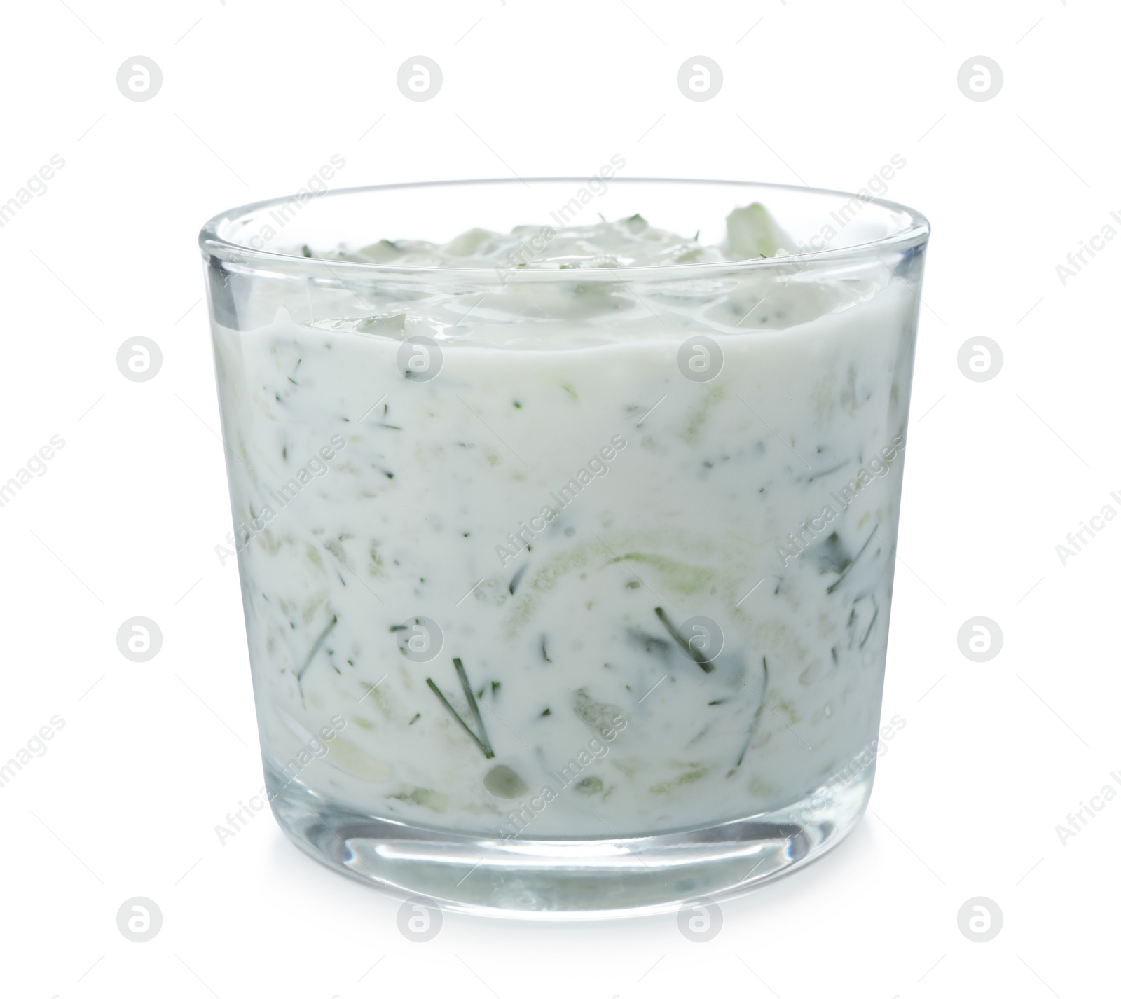 Photo of Glass with cucumber sauce on white background