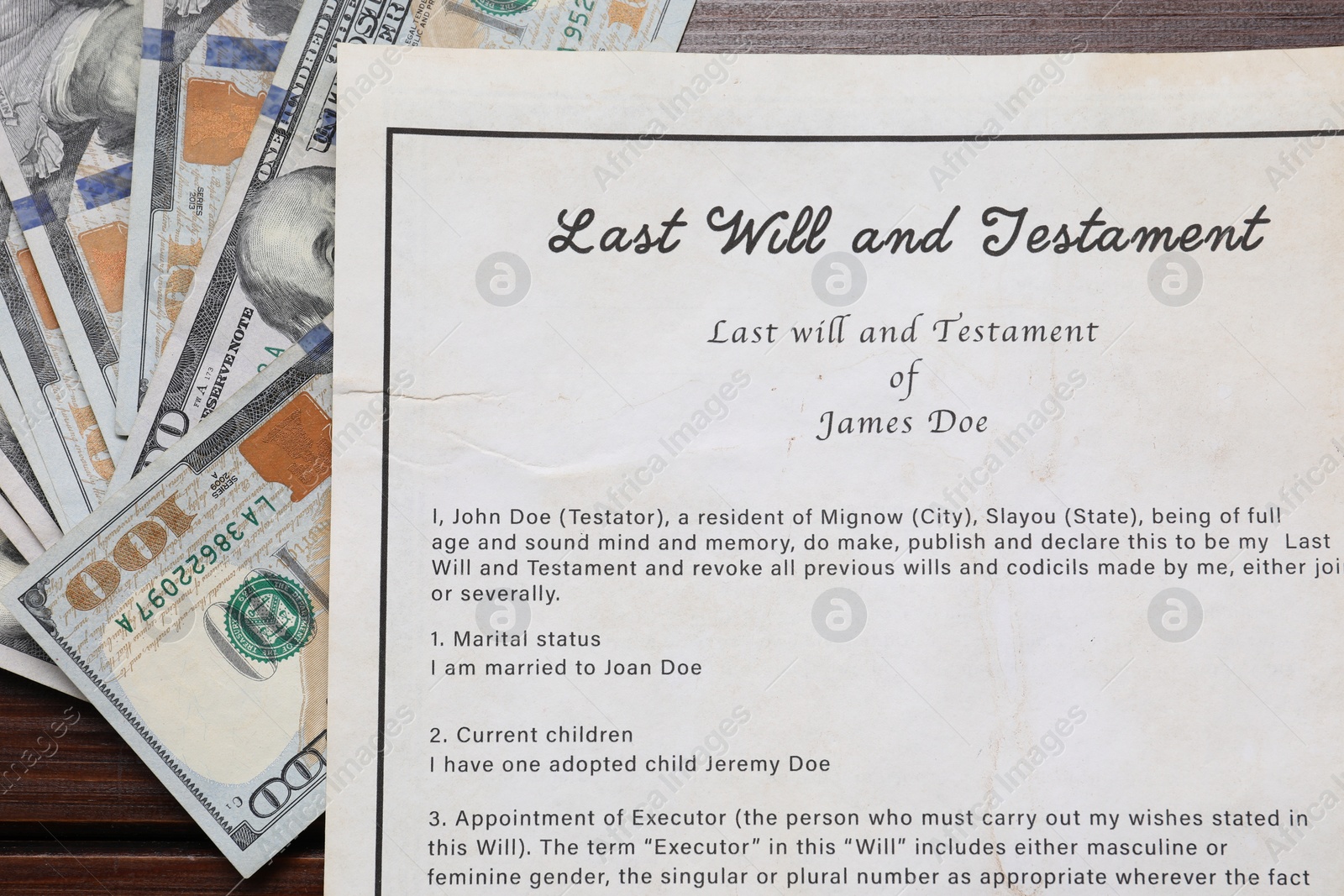 Photo of Last Will and Testament with dollar bills on wooden table, top view