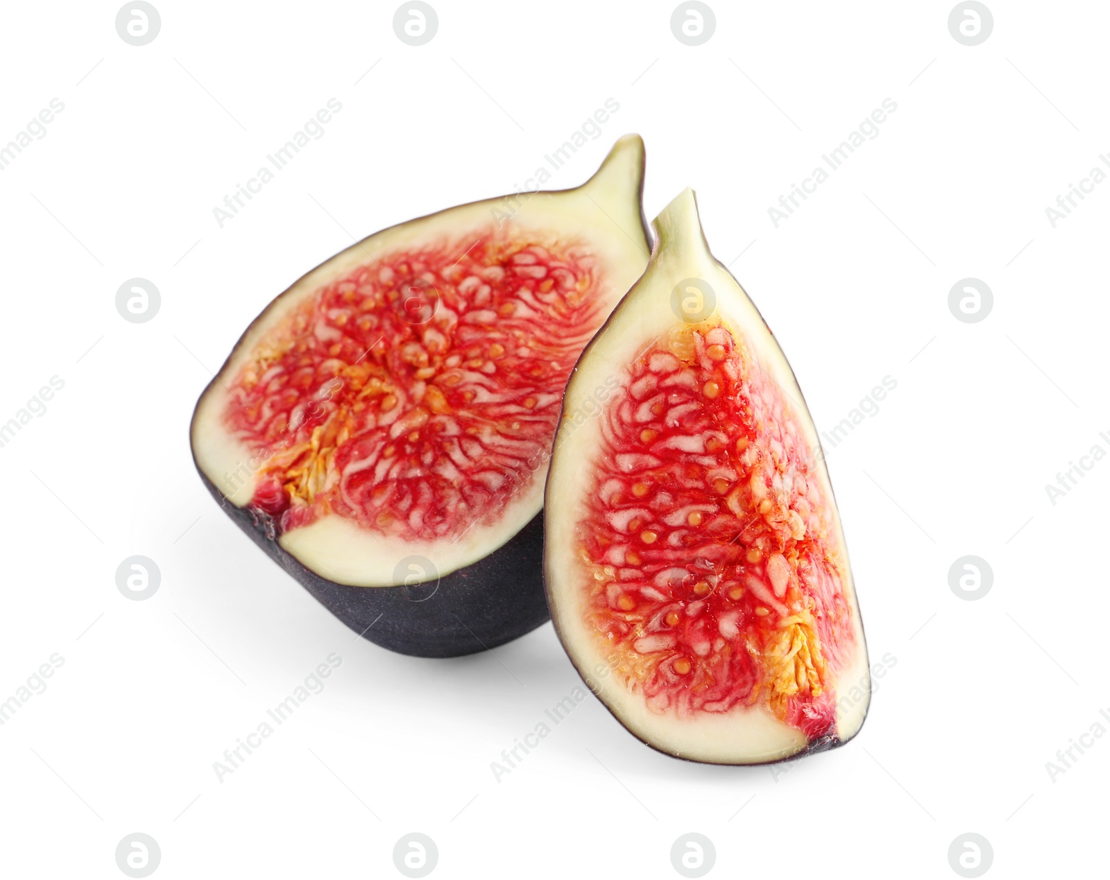 Photo of Pieces of ripe fresh fig isolated on white