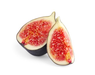 Photo of Pieces of ripe fresh fig isolated on white