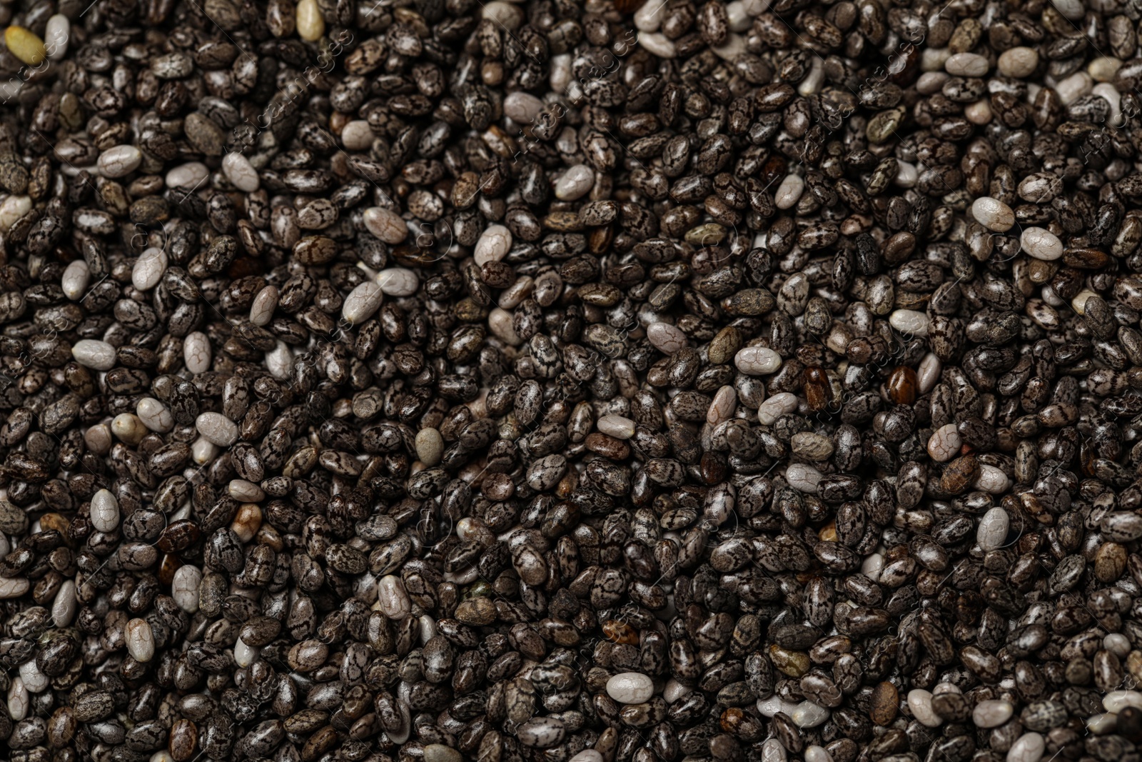 Photo of Chia seeds as background, top view. Organic superfood