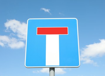 Photo of Traffic sign No Through Road For Vehicles against blue sky
