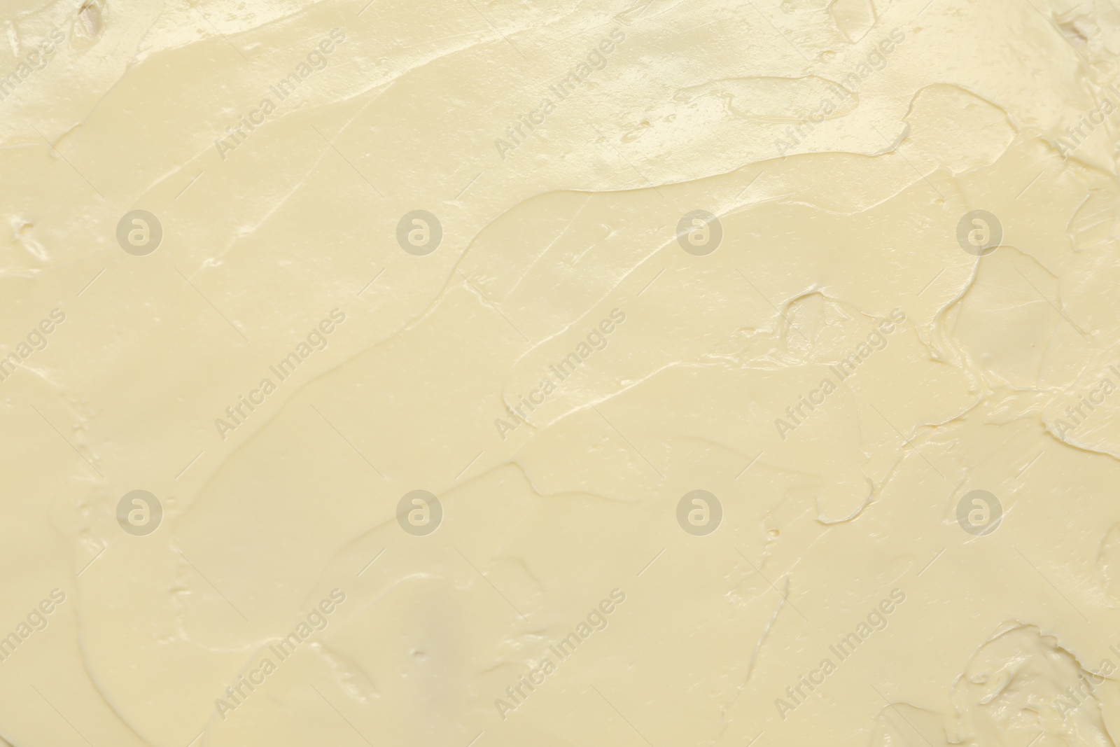 Photo of Texture of fresh natural butter as background, top view