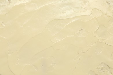 Photo of Texture of fresh natural butter as background, top view