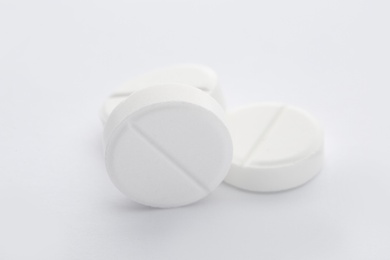 Photo of Pills on white background. Medical treatment