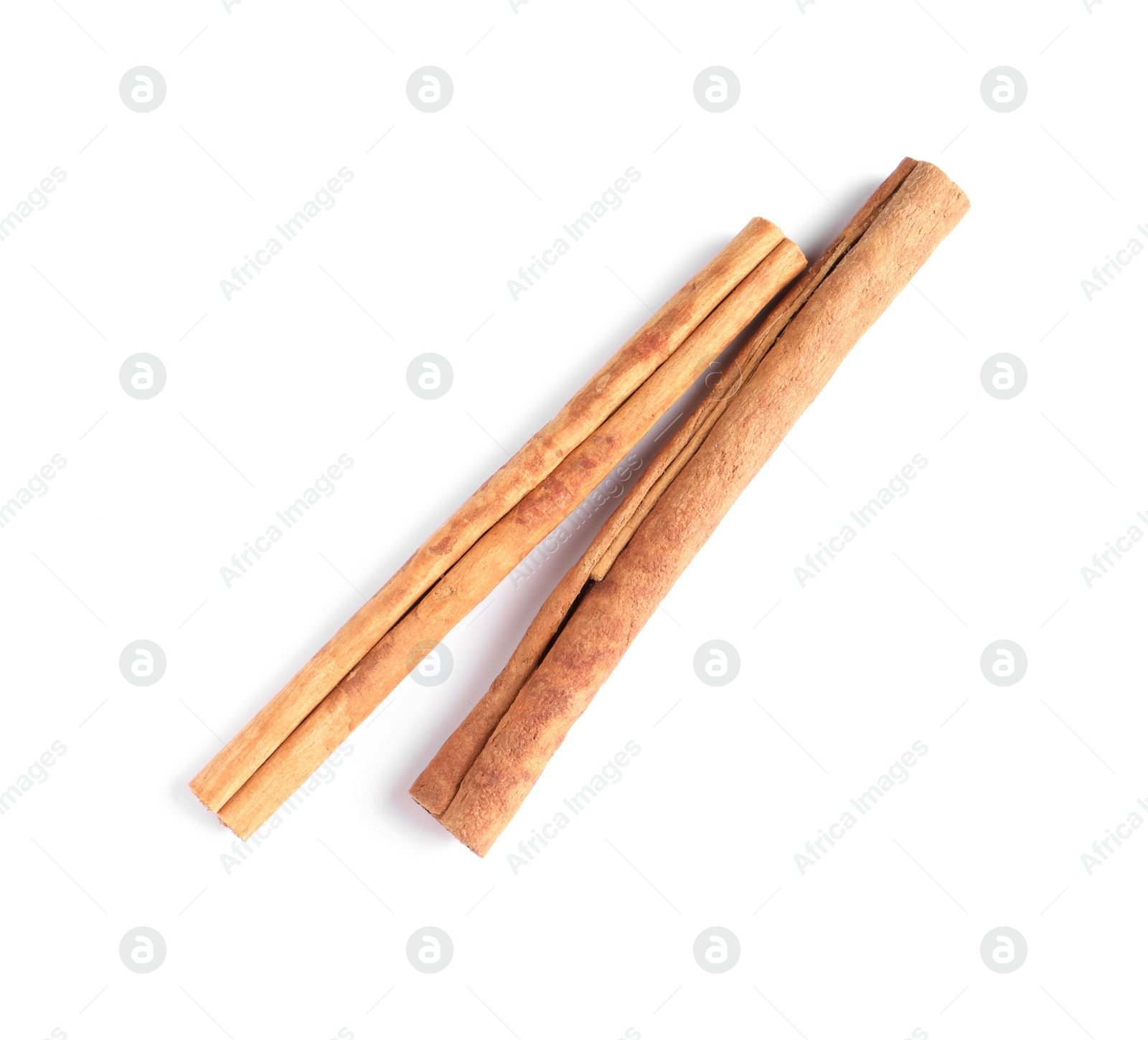 Photo of Cinnamon sticks isolated on white, top view