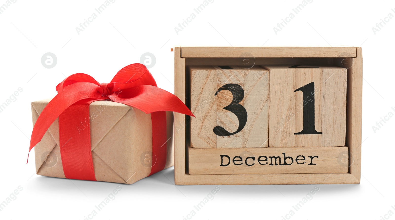 Photo of Wooden block calendar and gift box on white background. Christmas countdown