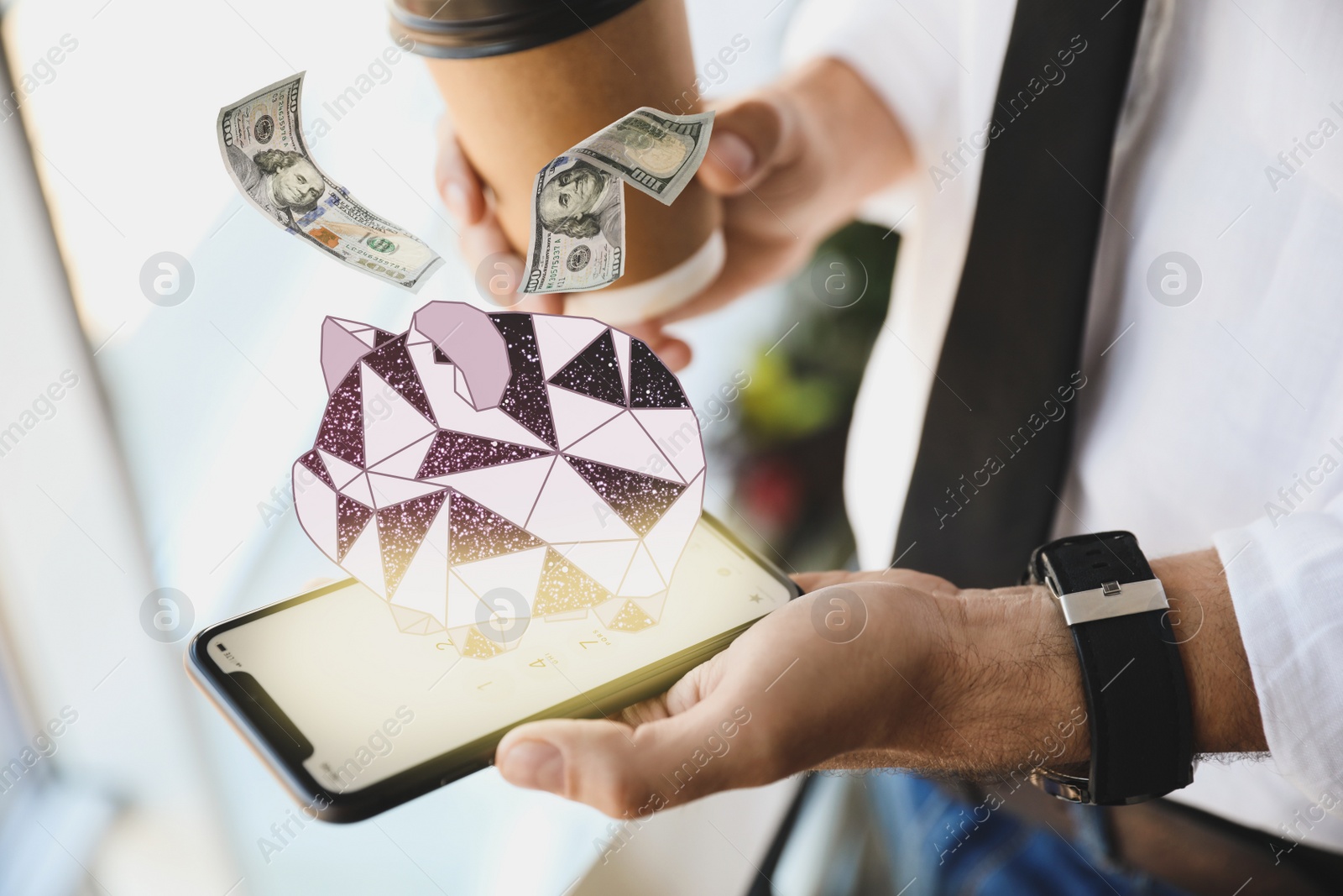 Image of Man using online bank application on his smartphone indoors