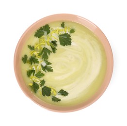 Photo of Bowl of delicious leek soup isolated on white, top view