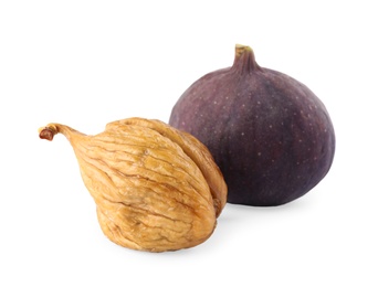 Tasty dried and raw figs on white background