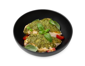 Delicious chicken breasts with pesto sauce, tomatoes and basil isolated on white