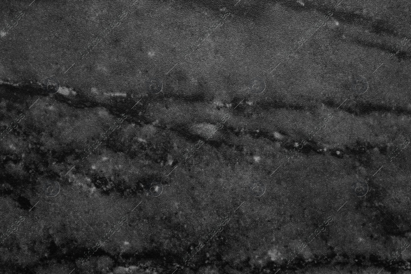 Image of Texture of black marble stone surface as background, closeup