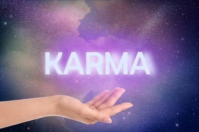 Image of Karma concept. Woman against starry sky in night, closeup of hand