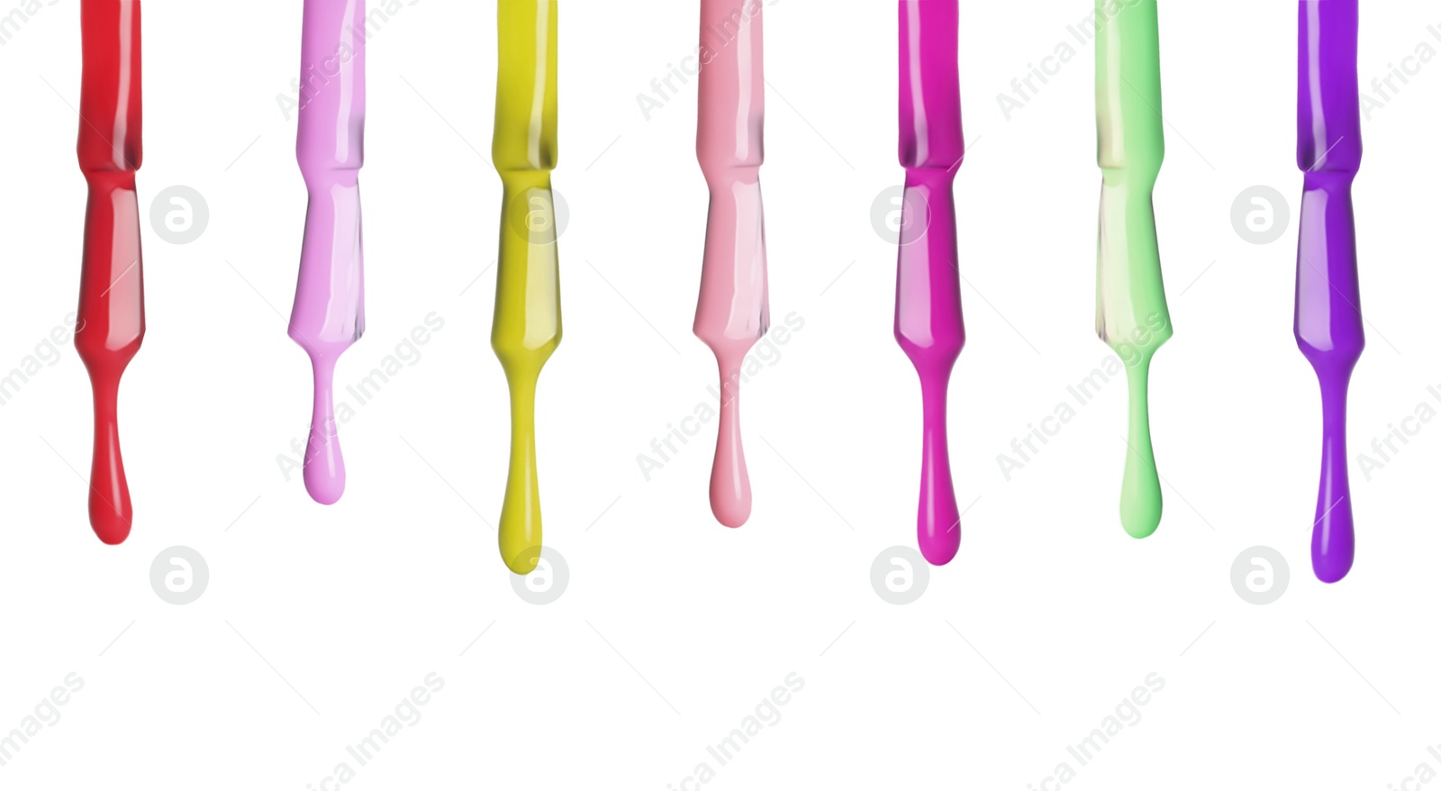 Image of Set of different nail polishes dripping on white background
