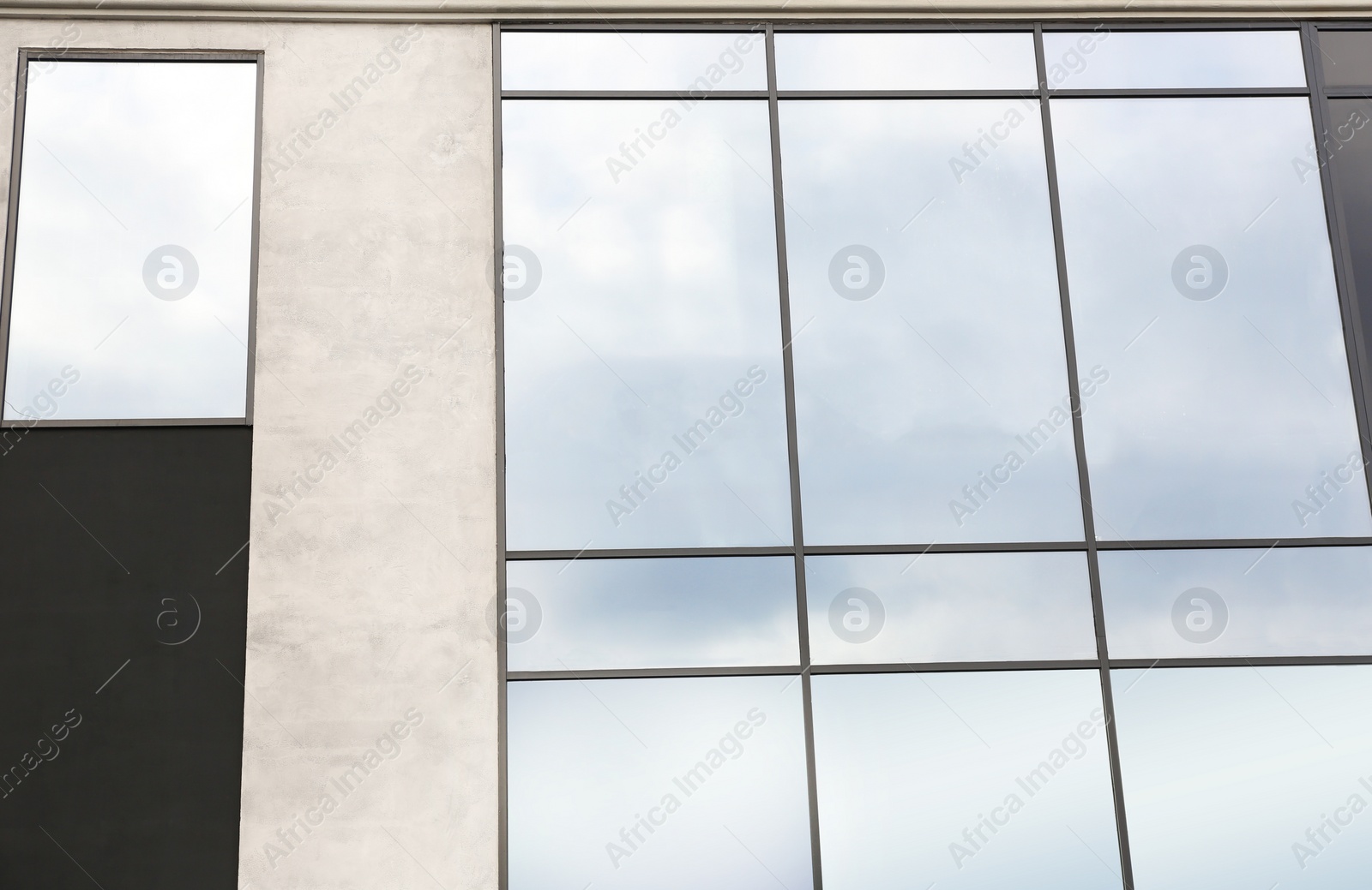 Photo of Modern office building with tinted windows. Urban architecture