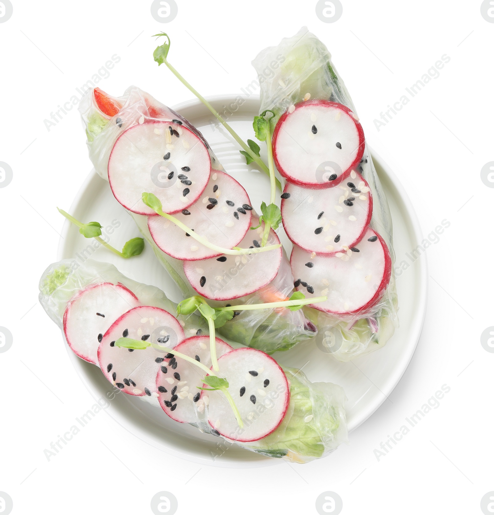 Photo of Delicious spring rolls wrapped in rice paper isolated on white, top view