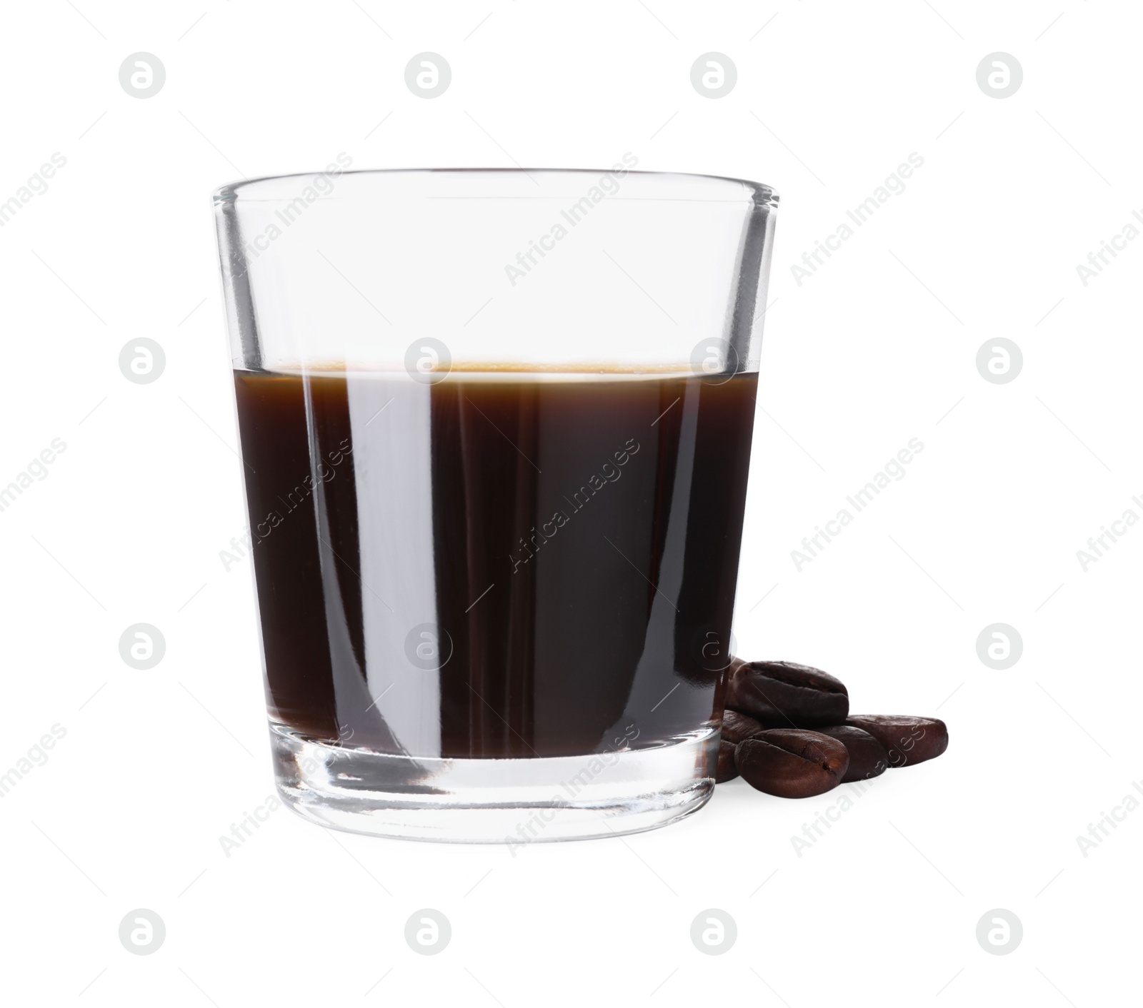 Photo of Shot glass with coffee liqueur and beans isolated on white