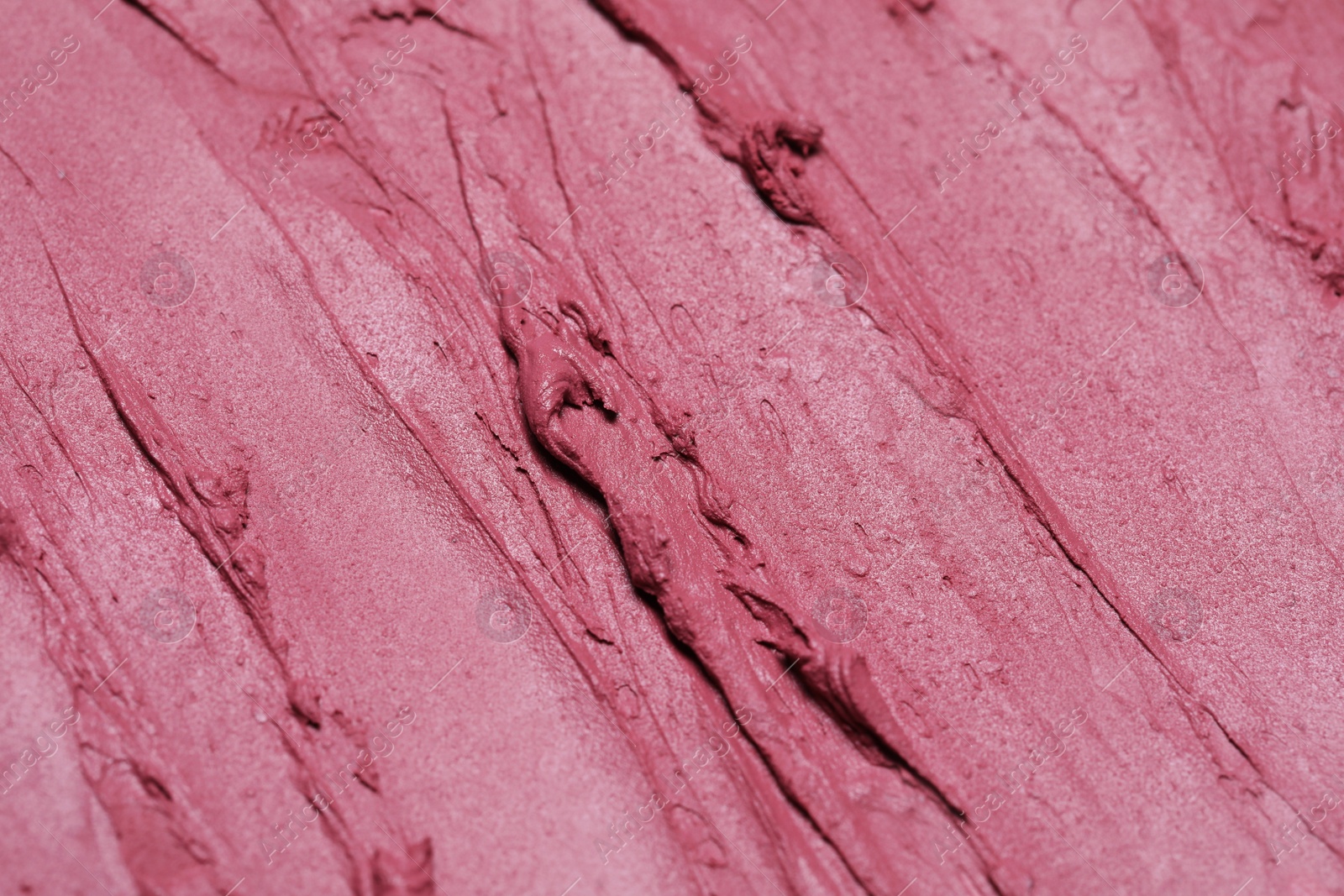 Photo of Texture of beautiful lipstick as background, closeup