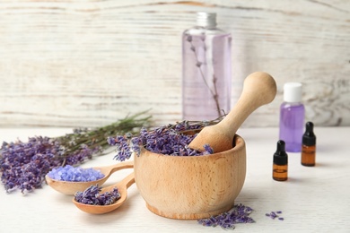 Composition with lavender flowers and natural cosmetic on table