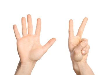 Photo of Man showing sign seven on white background, closeup. Body language