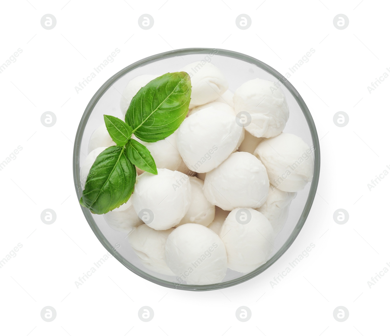 Photo of Bowl with mozzarella cheese balls and basil on white background, top view