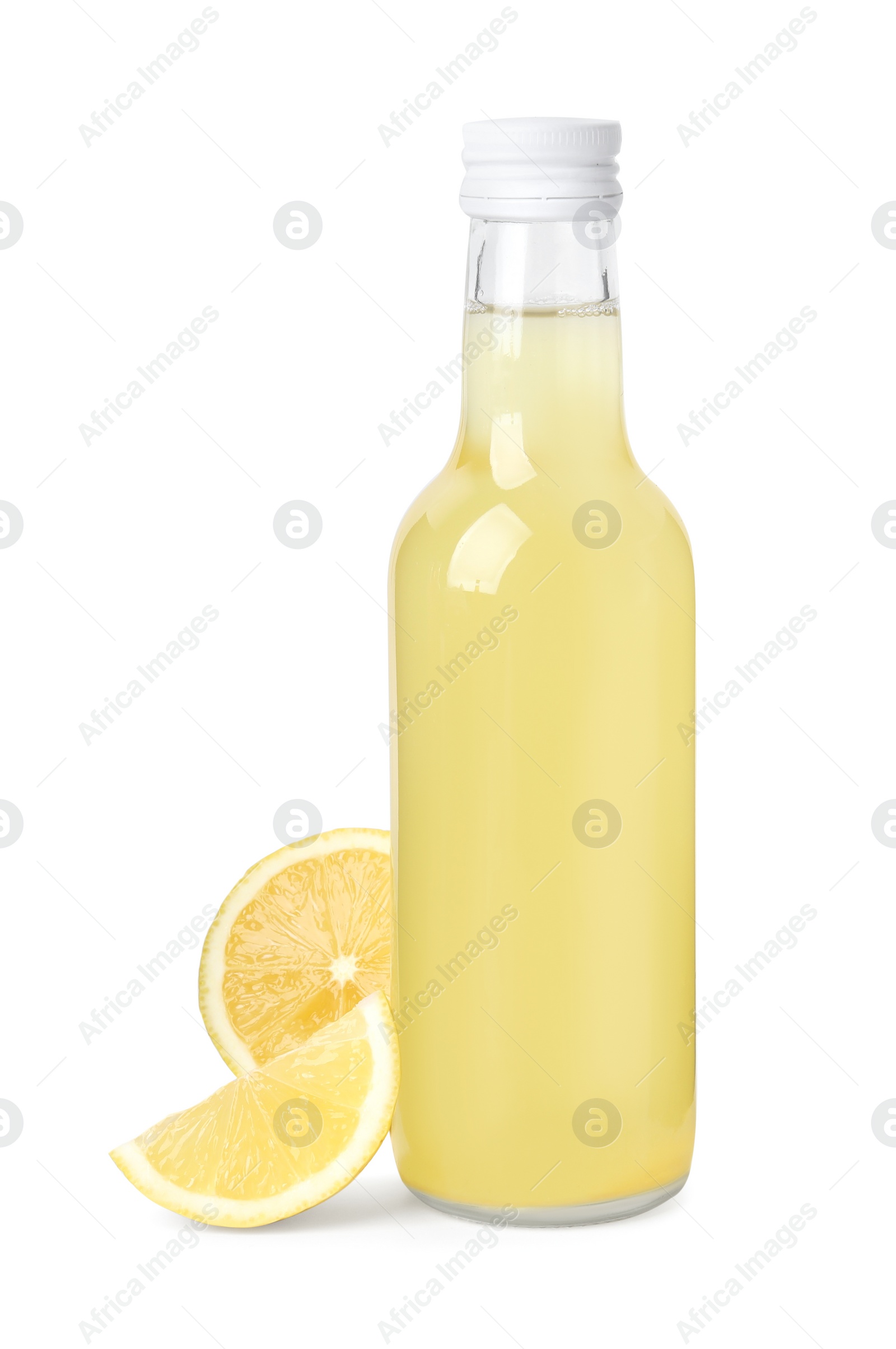 Photo of Delicious kombucha in glass bottle and lemon isolated on white