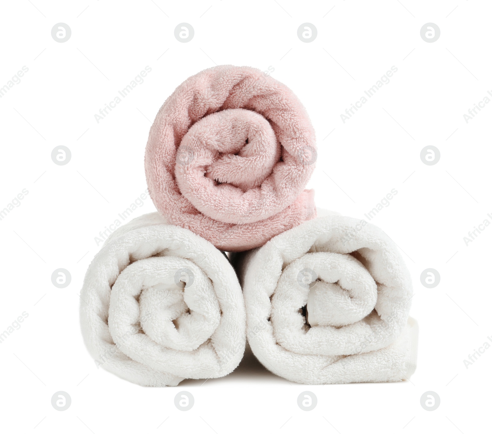 Photo of Rolled soft terry towels on white background