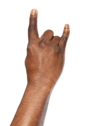 African-American man showing ROCK gesture on white background, closeup