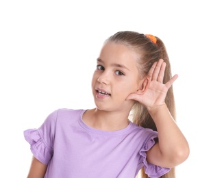 Photo of Cute little girl with hearing problem on white background