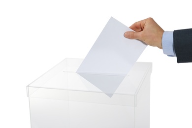 Photo of Man putting his vote into ballot box on white background, closeup