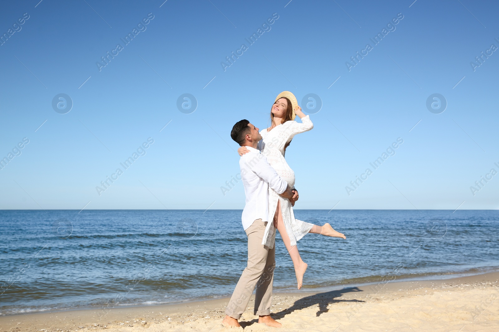 Photo of Lovely couple having fun on sea beach